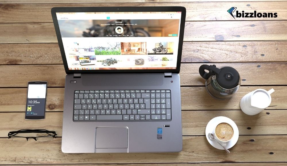 4-tips-for-small-businesses-to-improve-their-web-safety-3 Silver Laptop Next to Coffe Cup Smartphone and Glasses