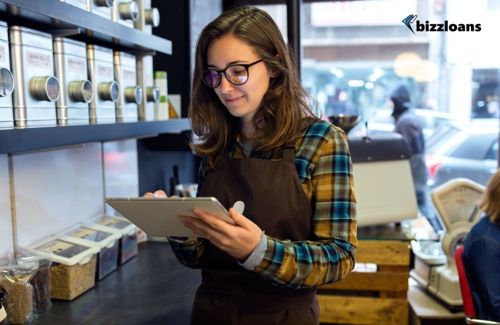 inventory-management-benefits-and-techniques-for-2021-1 Young business owner doing inventory management in a retail shop
