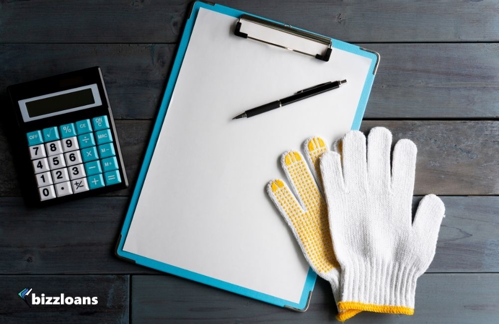 the-complete-guide-to-pricing-strategies-14-types-and-examples pricing strategy concept: pen, paper, calculator and gloves on the table
