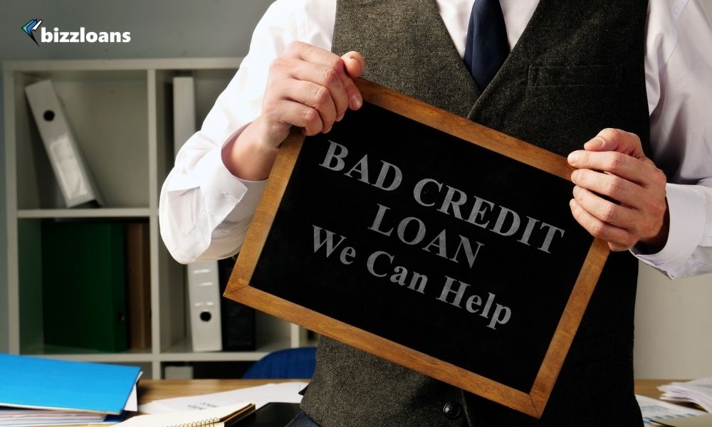 bad-credit-business-loans-in-australia (1) Man with sign Bad Credit Loan We can help.