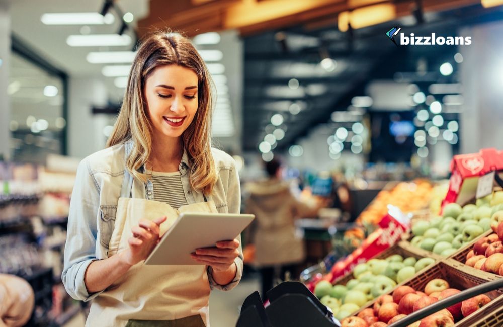 how-to-manage-supply-chain-disruptions-for-small-businesses young business woman doing inventory in her grocery store