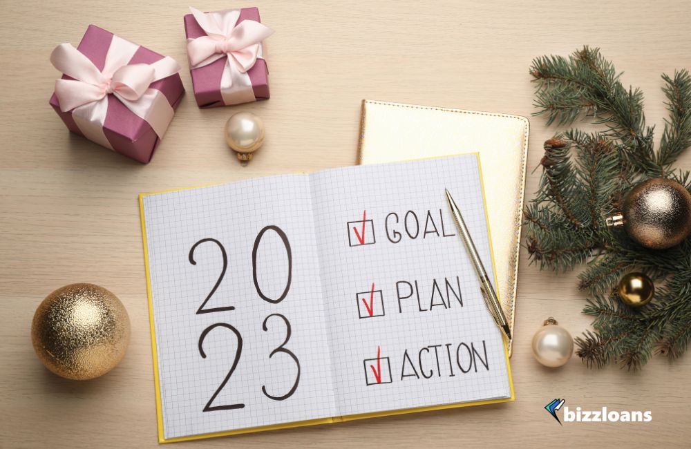 how-to-revive-your-business-plan-in-2023 Flat Lay Composition of Notebook with Text 2023 Goal, Plan, Action