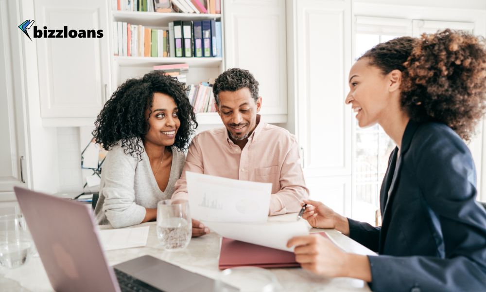 an-insightful-guide-to-available-business-loans two business owners talking with a loan broker
