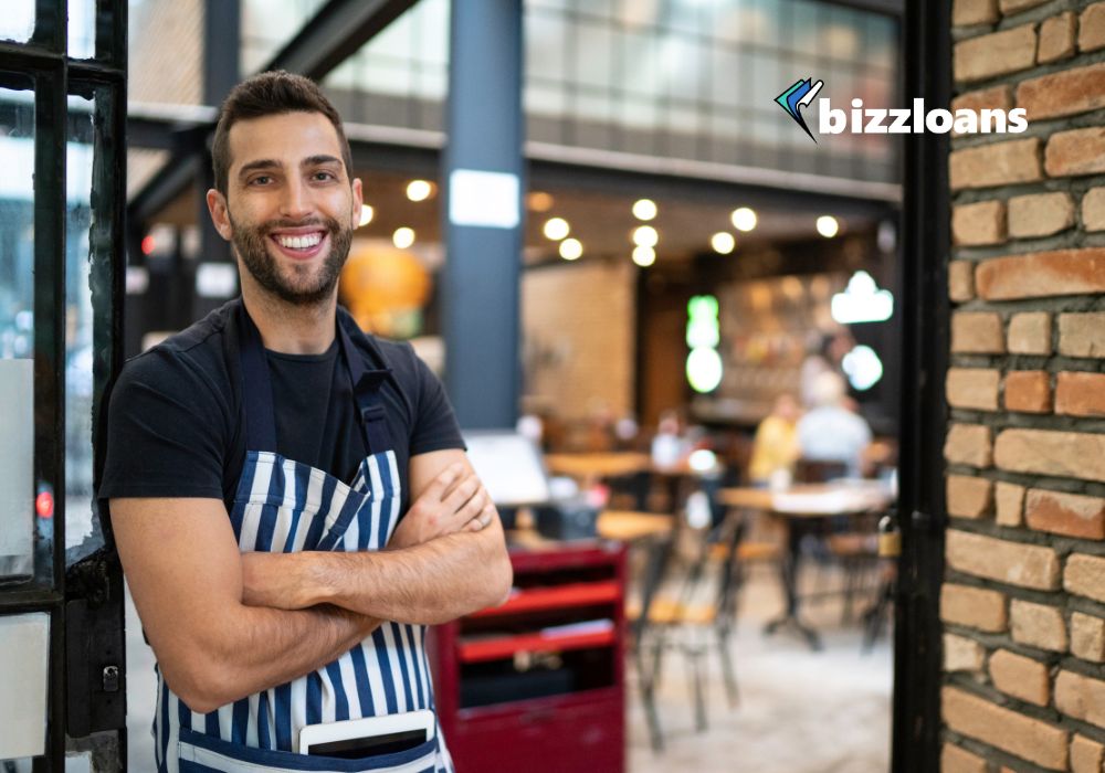 a-quarter-million-ambitions-the-nuts-and-bolts-of-250k-business-loans happy business owner in cafe